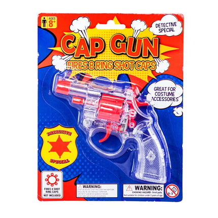 Toy cap gun with clear plastic body and red barrel, packaged in blister card
