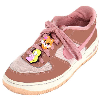 Cute shoe charm on pink sneaker, featuring small animal face patches