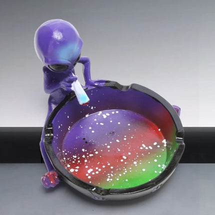 Purple alien ashtray with galaxy bowl and cigarette