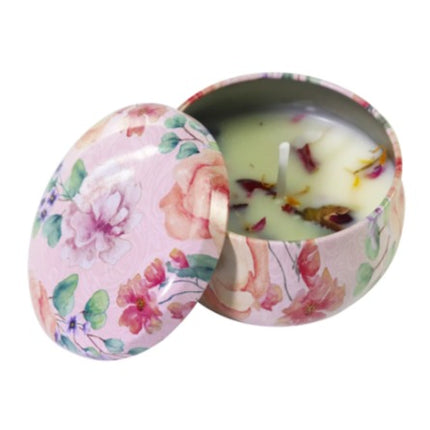 Floral votive soy candle in decorated tin, lid open to show wick and wax