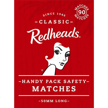 Red matchbox close-up showing Redheads Classic logo and handy pack safety matches text