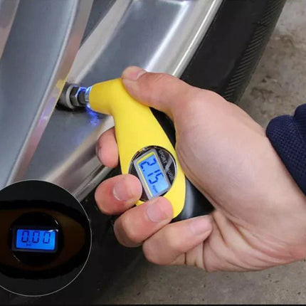 Digital tyre gauge used on car wheel valve, blue LCD pressure reading
