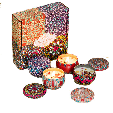 4 patterned soy candle tins with lids in decorative gift box