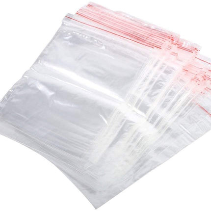 White ziplock bags set with red zipper strip, clear plastic stack