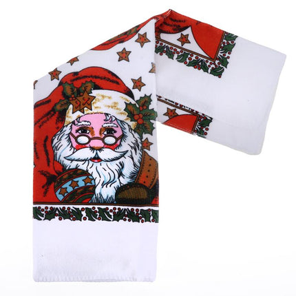 Folded Christmas tea towel with Santa face on red-and-white, decorated border.
