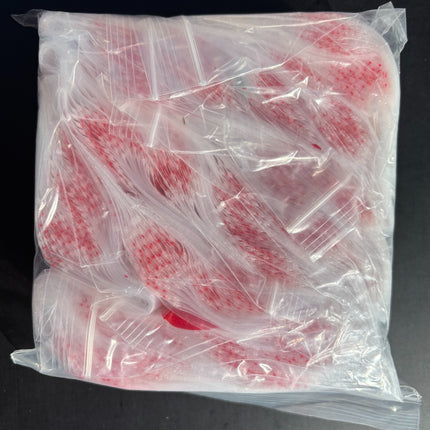 Assorted clear zip bags in bulk pack, showing red apple print through plastic