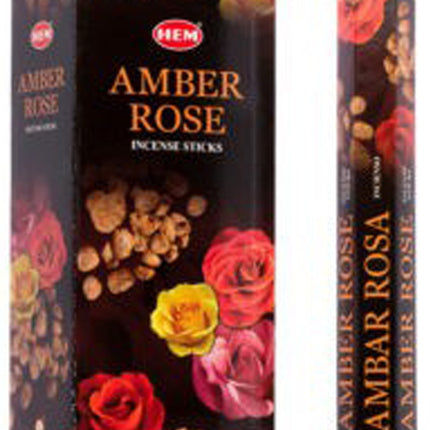 Incense sticks box with amber rose flowers and gold flecks on dark floral cover