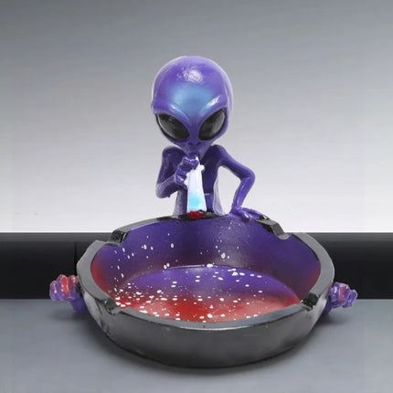 Purple alien ashtray with galaxy bowl and purple figurine