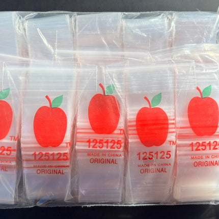 Set of mini clear ziplock bags with red apple labels in resealable pack
