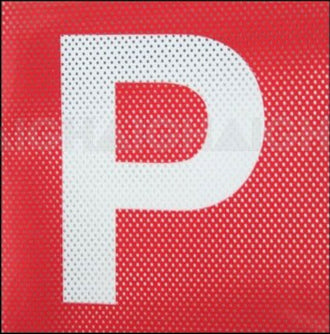 Red perforated P plate with white letter P on square badge