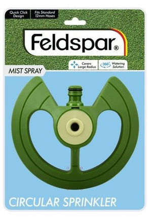 Green plastic circular stationary sprinkler with mist spray nozzle