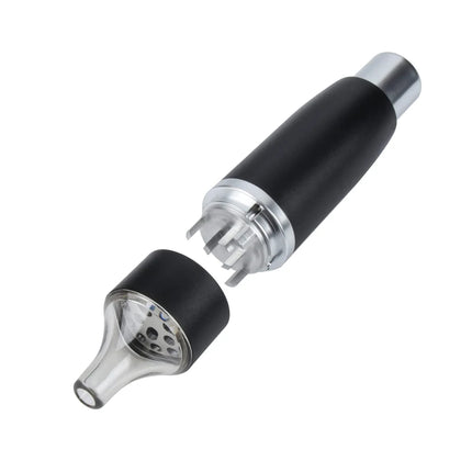 Manual press grinder with black barrel, silver mechanism, and funnel-shaped metal grinding head
