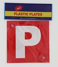 Red square plastic plate with white P and suction cup backing