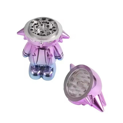 Purple chrome grinder figurine with open top grinder chamber, side angle view