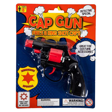 Black cap gun toy in retail blister pack with red barrel and handle, detective themed.
