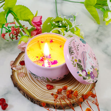 Pink floral votive tin soy candle with lit flame and lid open