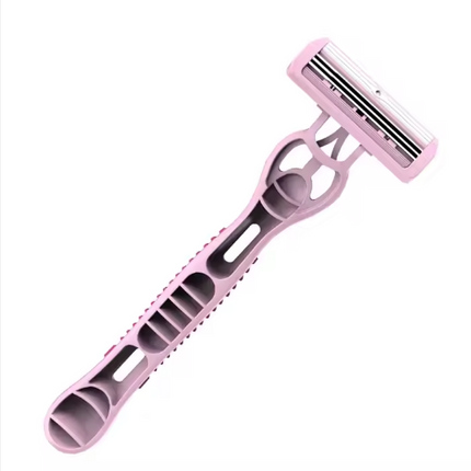 Triple-blade razor with pink handle and gray blade holder, angled view