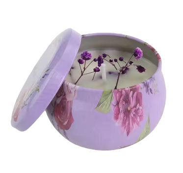 Floral printed soy scented votive candle tin with lid propped open, pastel purple