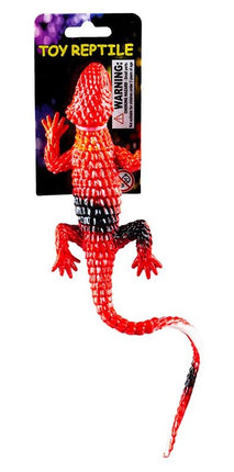 Red textured toy lizard with long tail and four clawed feet, posed standing