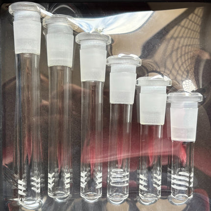 Clear glass stem tubes with white caps, arranged as a 6-piece set of varying sizes