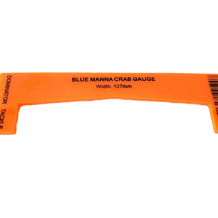 Orange plastic crab gauge with width 12.7mm marking and measurement scale on side