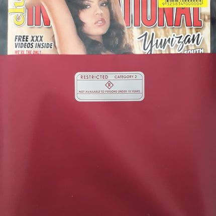 Two magazine covers in red packaging with model on cover, barcode and restricted label