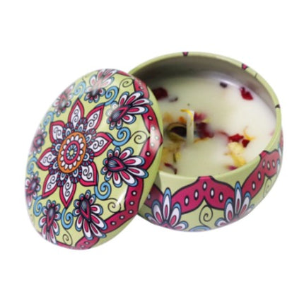 Floral patterned votive soy candle in tin, open lid with white wax