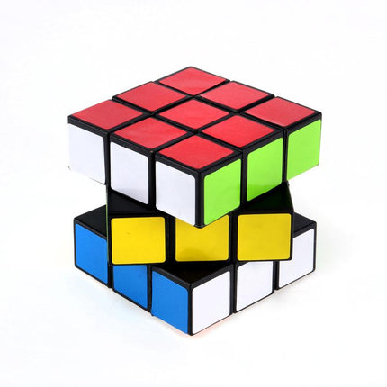 Cube puzzle showing red top, green side, yellow, blue and white blocks