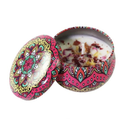 Soy votive candle in patterned metal tin, lid closed, white-yellow wax top