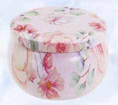 Floral votive soy candle in decorated tin with closed lid