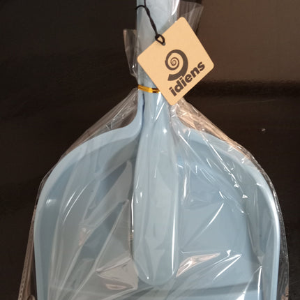 Light blue dustpan and brush set sealed in clear plastic packaging