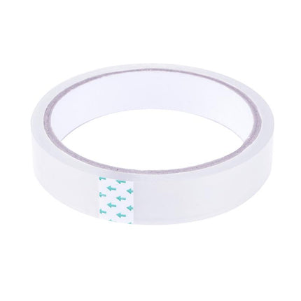 Sellotape clear transparent tape roll with visible backing strip on the inner edge