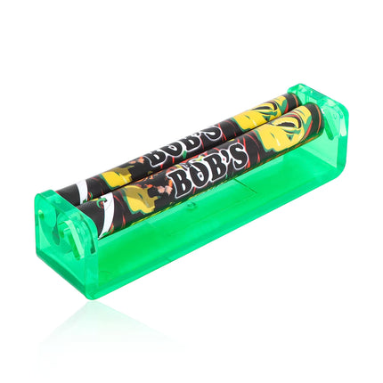 Green cone rolling machine with printed rolling paper inside clear plastic sleeve