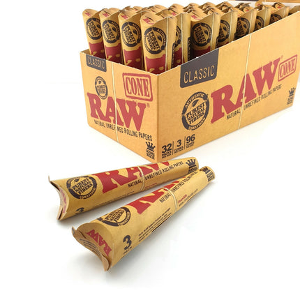 RAW Classic cone rolling papers, two brown tubes with RAW and CONE branding.