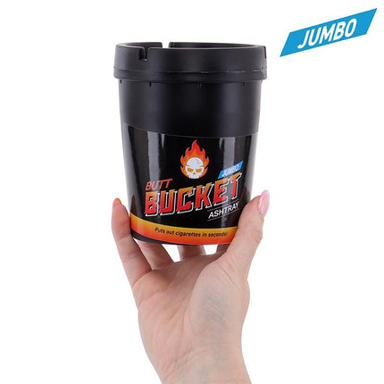 Hand holding black jumbo ashtray with removable lid and flame logo front label