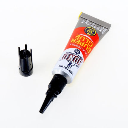 Liquid super glue tube with precision applicator tip and black cap
