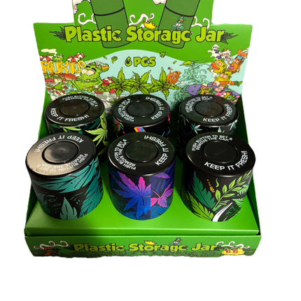 Three front storage jars with leaf designs, set of 6 on green display tray