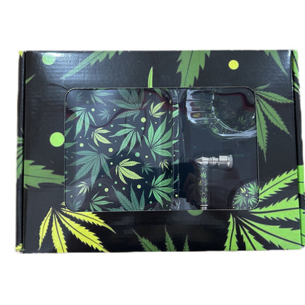 4-piece smoke kit box with cannabis-leaf print and window showing grinder and glass pieces