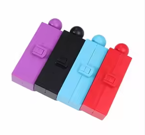 Cigarette mold maker set in purple, black, blue, and red with press balls
