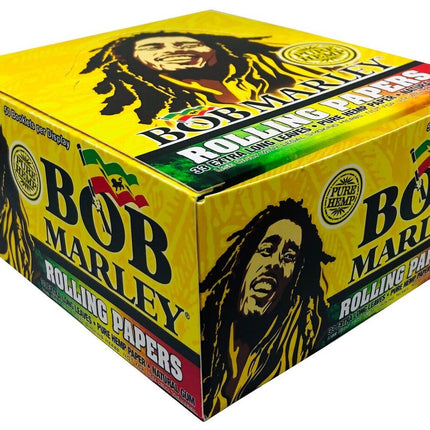 King-size rolling papers box, yellow Bob Marley branding with portrait and roll pack logos.