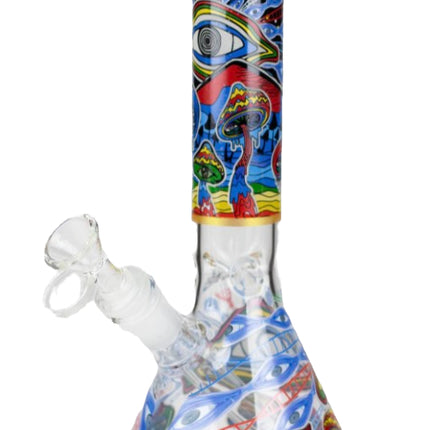 Glass water beaker with blue monster print and glass bubbler tube, gold rim.