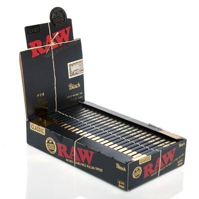 RAW Black 1 1/4 rolling papers display box with stacked paper packs