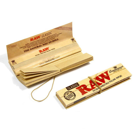 Classic RAW slim rolling papers with tips, stacked packs