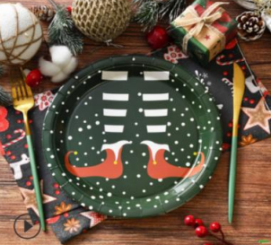 Christmas elf paper plate, green with white dots and cartoon elf graphic