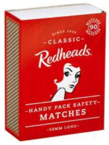 Red safety match box front view with Redheads logo and handy pack safety matches text
