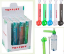 Top Puff display box view with puff devices and accessories, including green