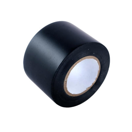 Black duct tape roll with exposed paper core