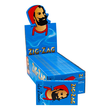 Blue Zig-Zag rolling papers display box with man portrait and Zig-Zag branding on front.