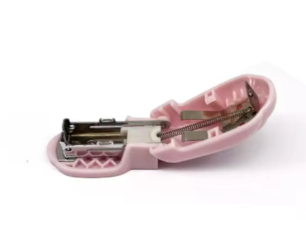 Pink mini stapler with exposed stapling mechanism and base, side view