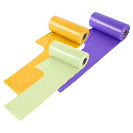 Unrolled scented bin liner sheets in yellow, light green, and purple strips